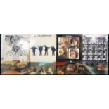 A collection of long play LP vinyl records pertaining to the Beatles and band members to include
