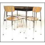 An original  retro 1970's Belgian Tavo dining table raised on chrome supports (  with the rare