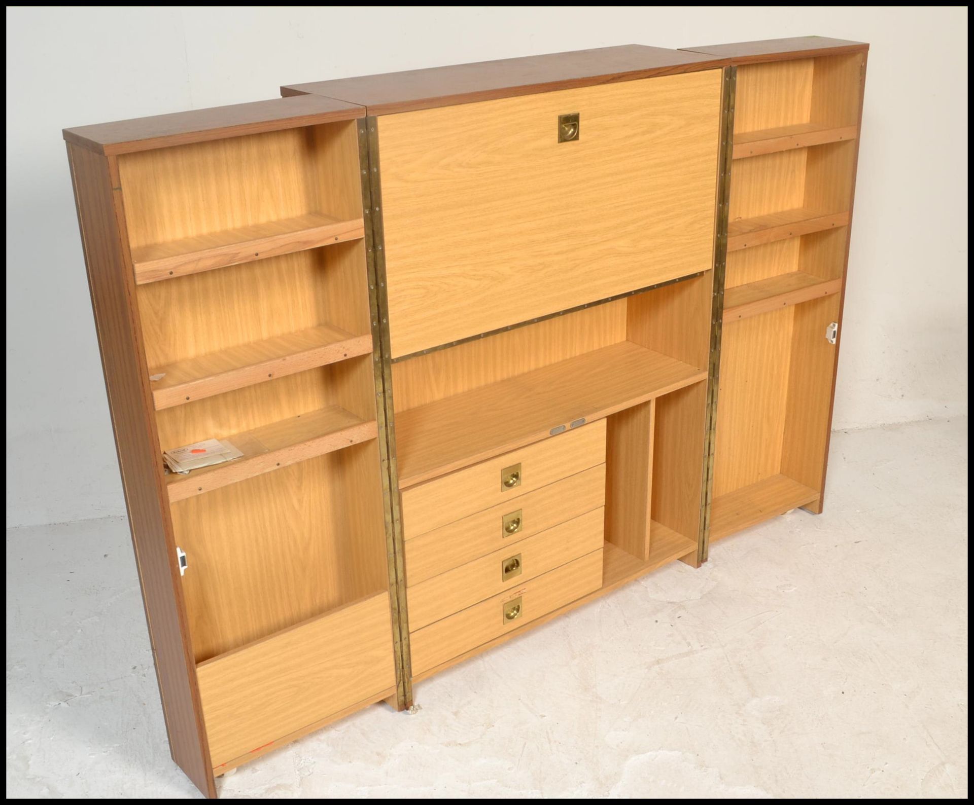 A 1970’s retro cube desk cabinet. Faux teak wood veneers with brass campaign  handles opening to - Bild 3 aus 9
