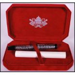 A Vatican Museums collection souvenir fountain pen having decorated with silver plated metal knot