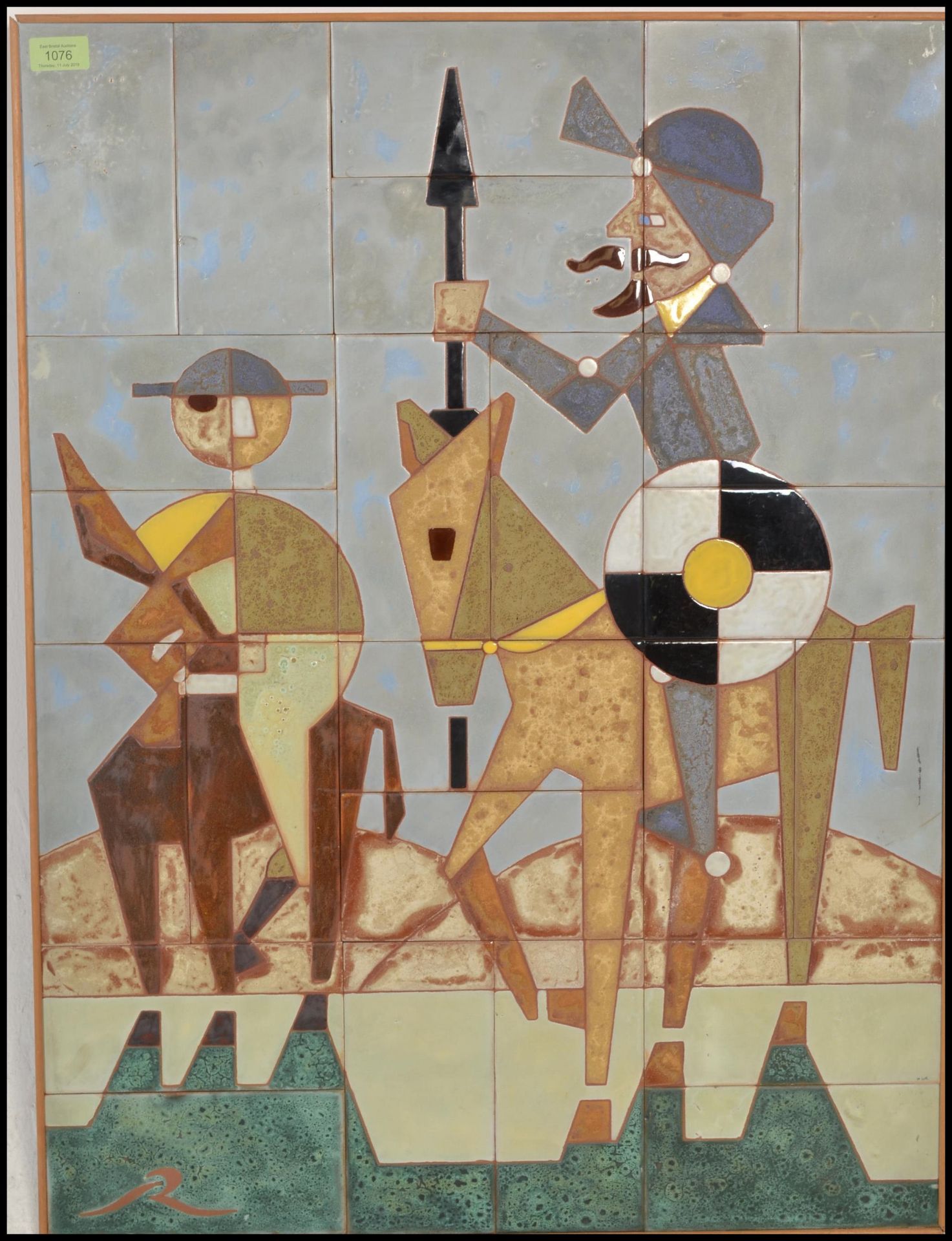 A vintage retro 20th Century tiled wall art panel depicting Don Quixote and Sanchez riding on