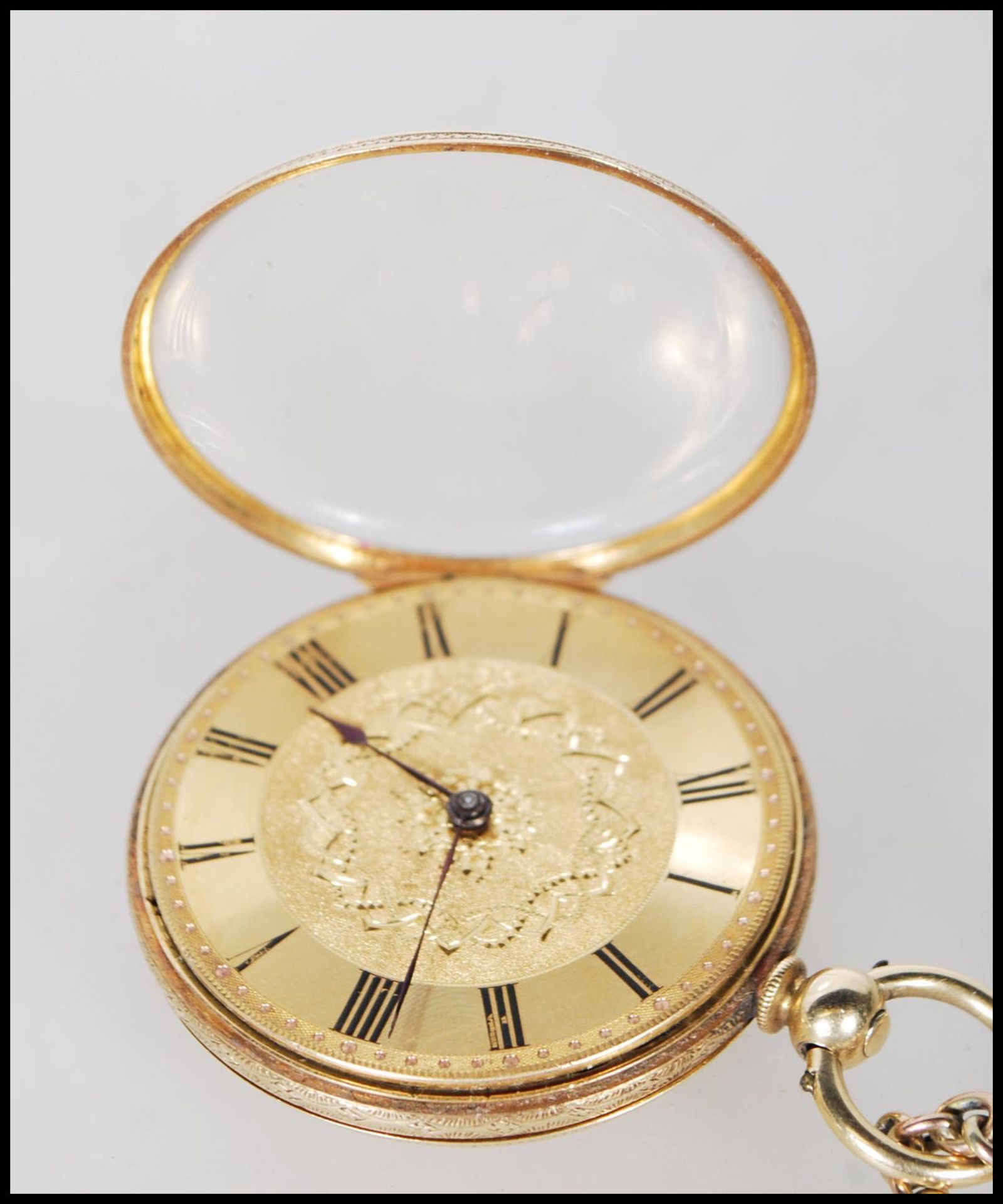 A vintage 18ct gold open faced pocket watch having a gilt face with roman numerals to the chapter - Image 7 of 7
