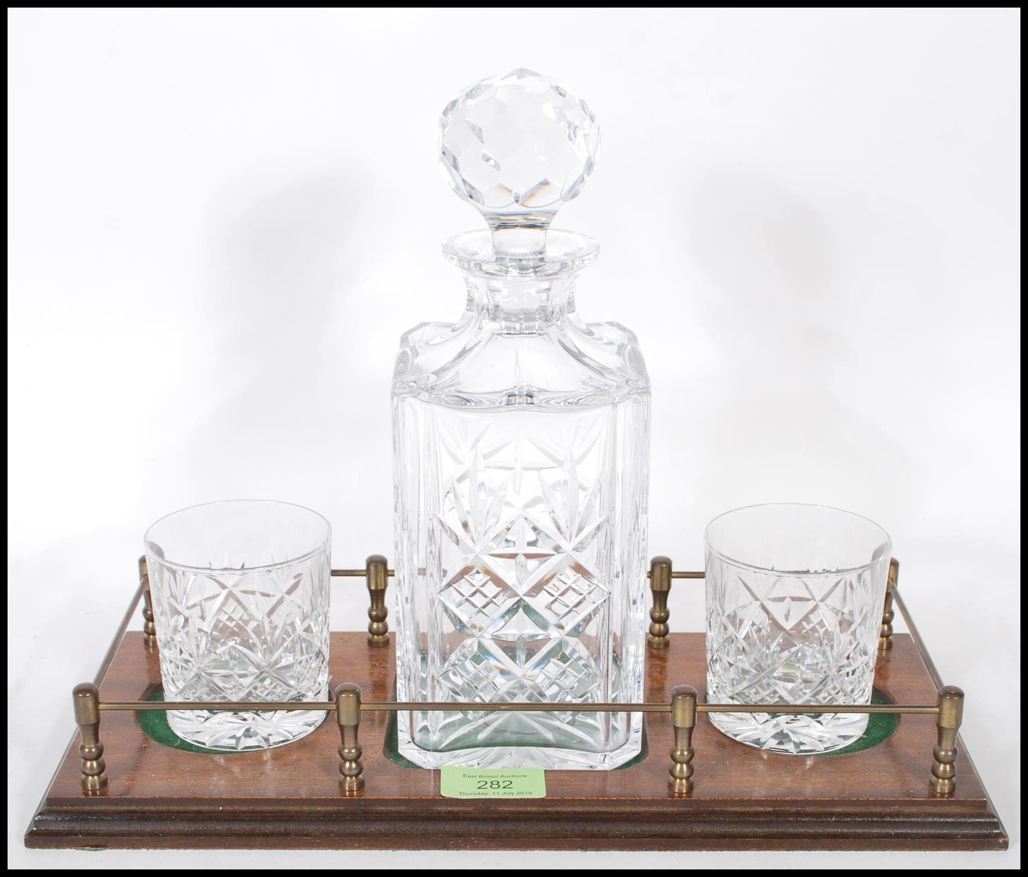 A vintage 20th Century cut glass decanter set having a stepped wooden base with a cut glass decanter - Image 3 of 8