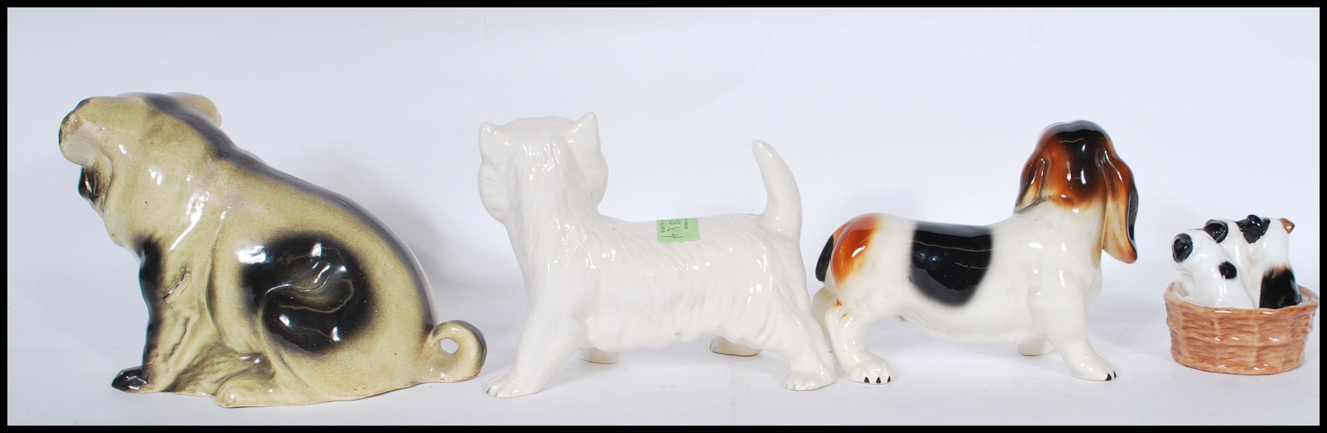 A ceramic 19th century Victorian Staffordshire figurine of a Pug dog.  Treacle glazed, of large form - Image 3 of 8