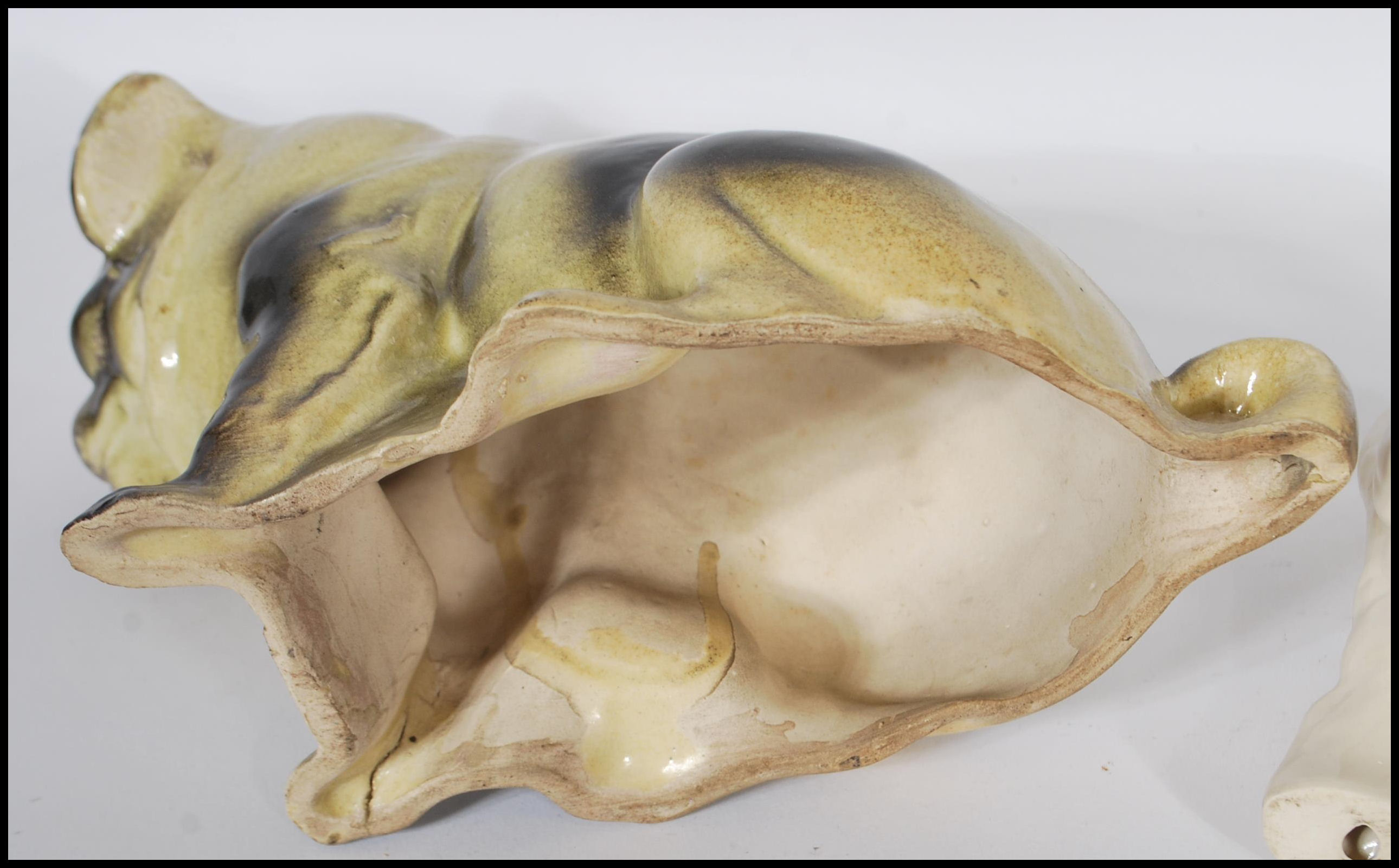 A ceramic 19th century Victorian Staffordshire figurine of a Pug dog.  Treacle glazed, of large form - Image 8 of 8