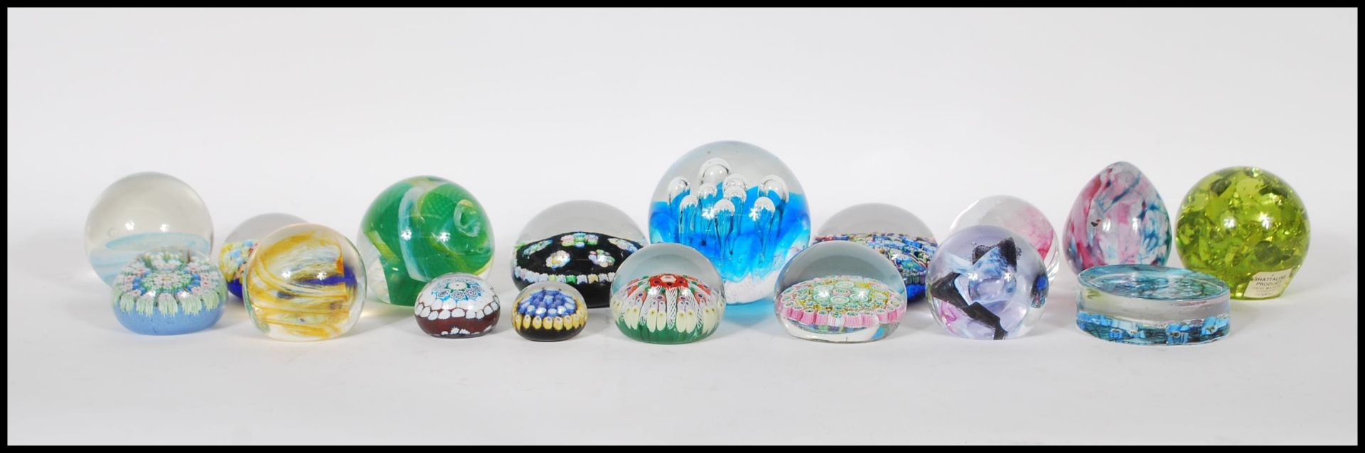 A good collection of retro vintage 20th Century studio art glass paperweights including Caithness,
