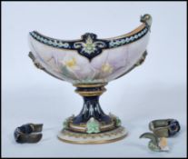 A Hadleys Worcester hand painted twin handled small centrepiece case (some damage)  having hand