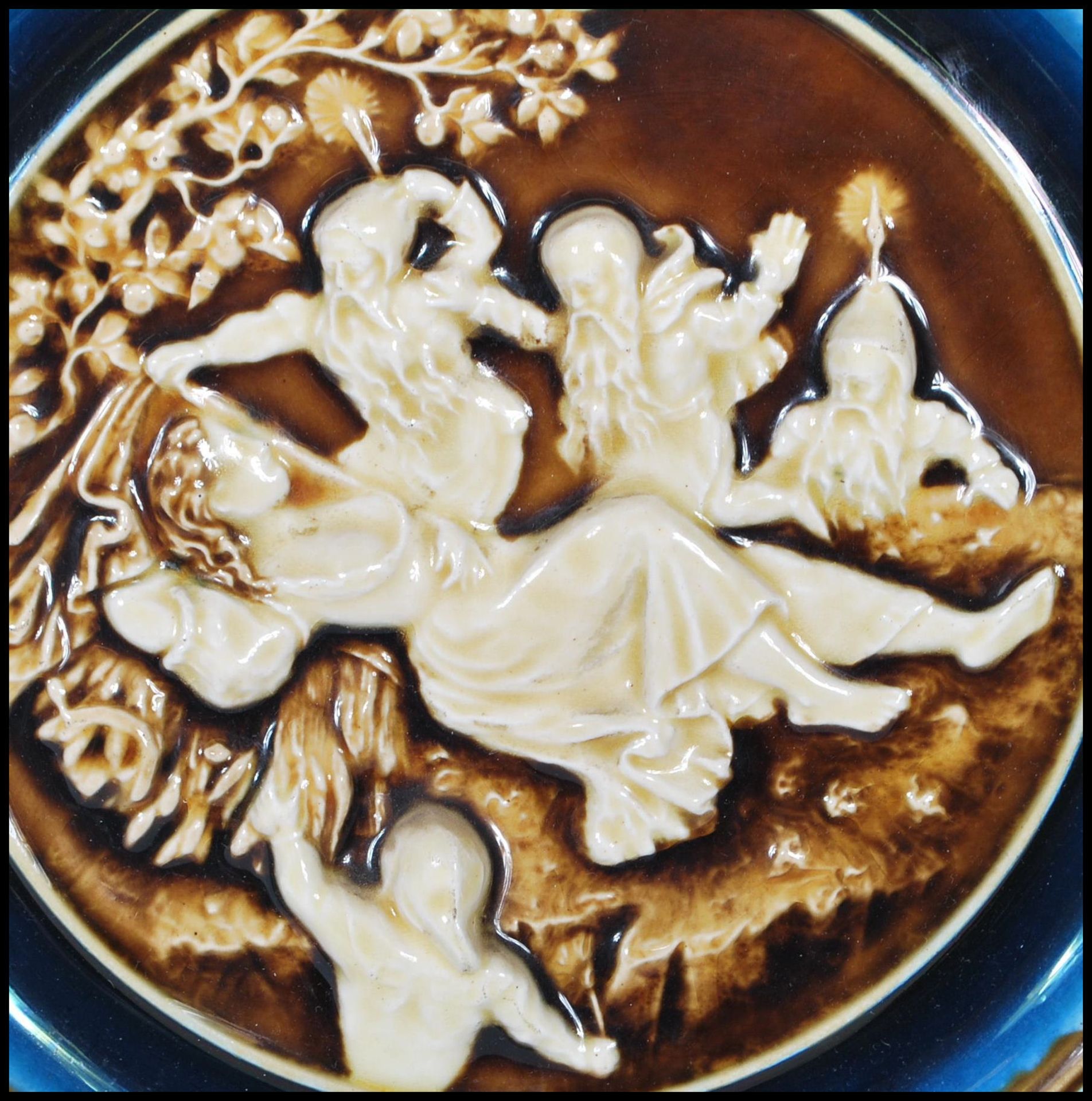 An Austrian 19th century porcelain wall charger having brown glaze with white cameo in relief centre - Bild 3 aus 6