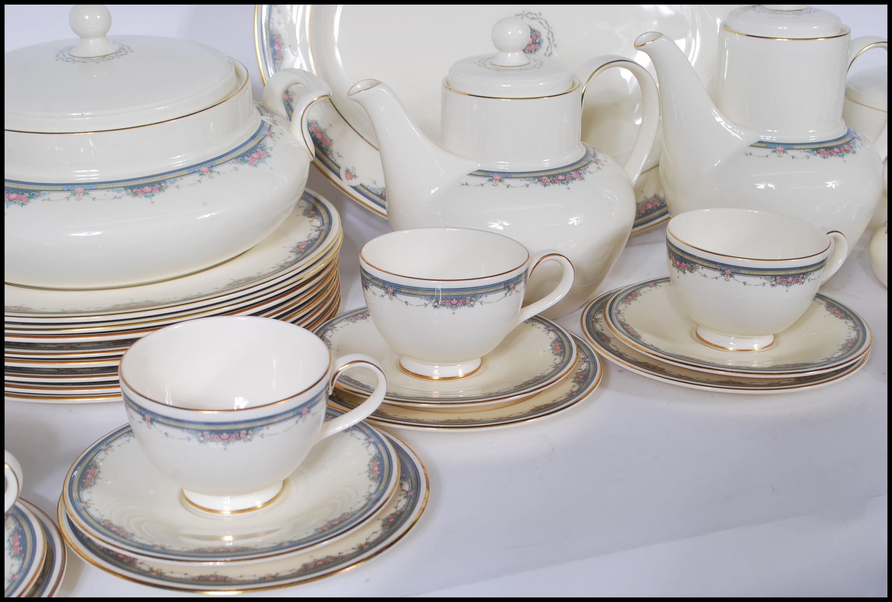 A 20th Century dinner and tea service by Royal Doulton in the Albany pattern having ivory white - Image 4 of 11