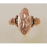 A 19th Century Victorian 9ct gold signet ring having engraved central cartouche and decorative