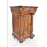 An early 20th Century oak pedestal hall cabinet / cupboard / pot stand. Topped with rouge marble
