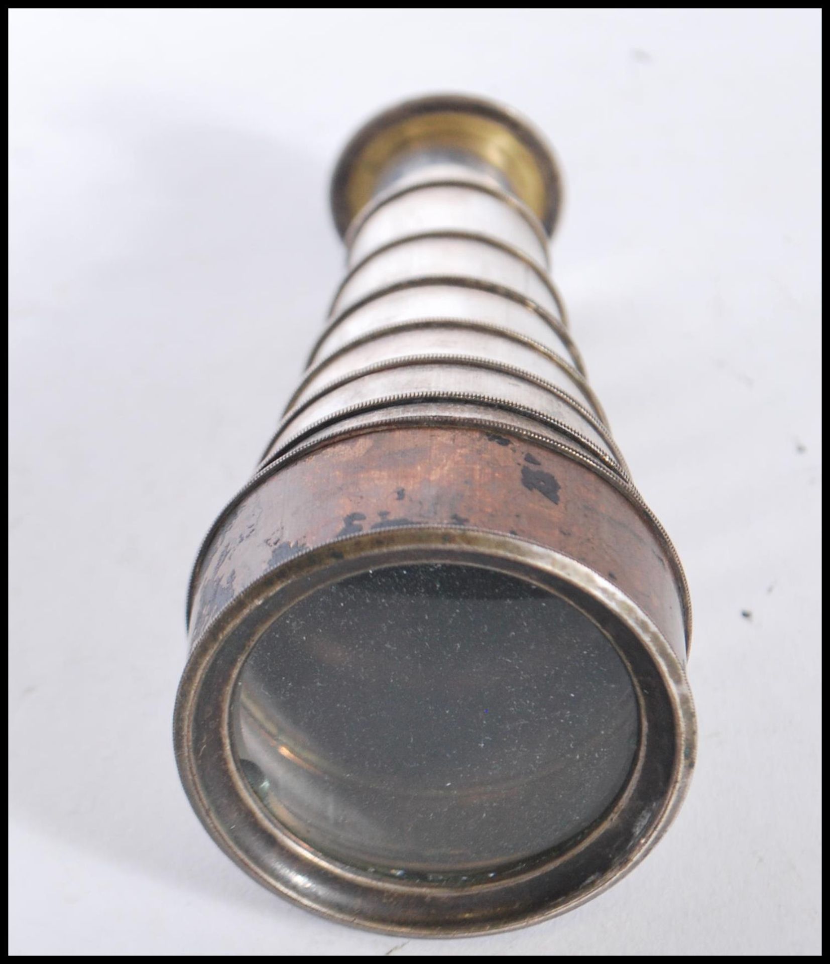 An early 20th / late 19th Century silver plated pocket spyglass monocular telescope, having eight - Image 3 of 6