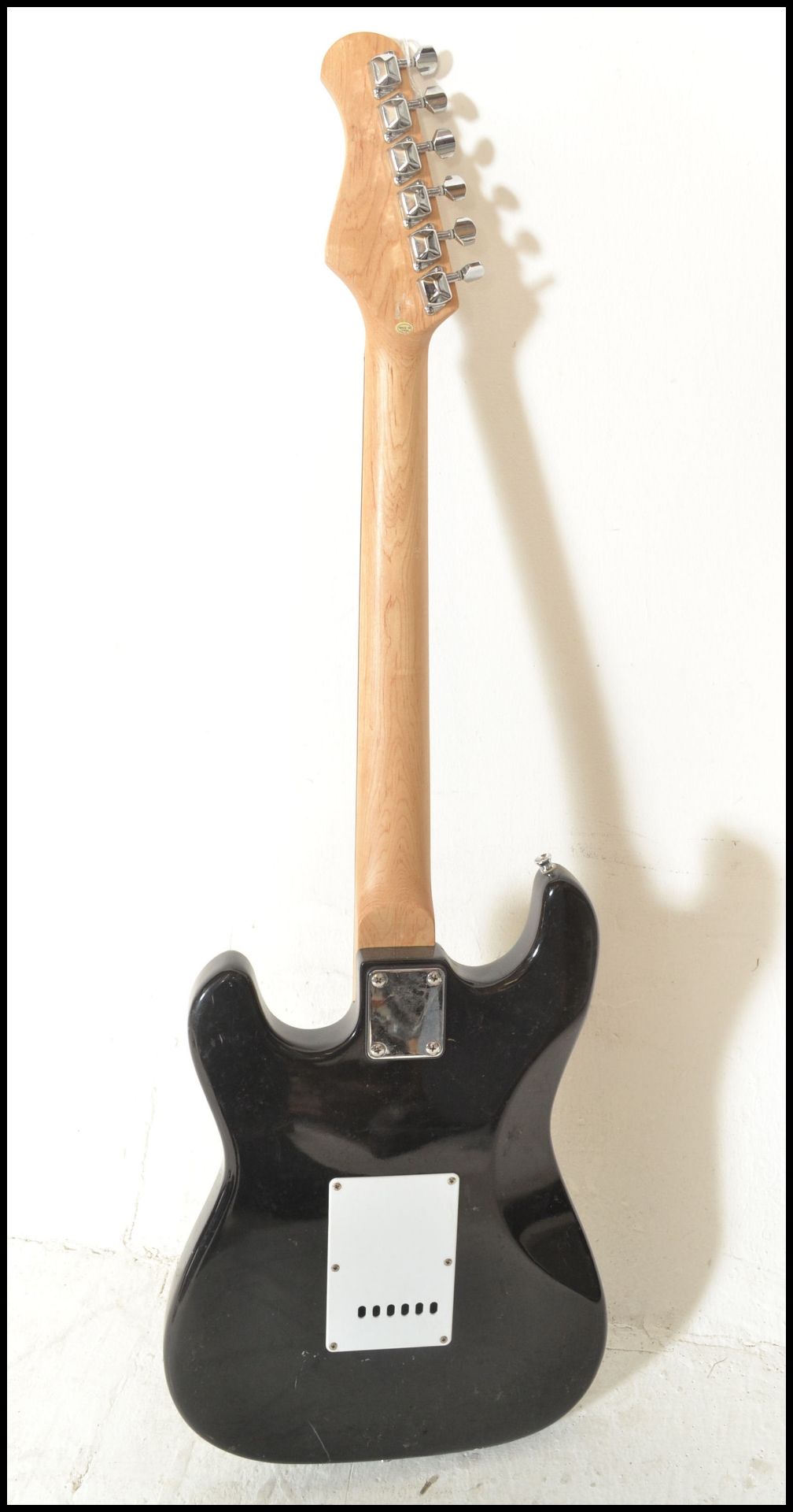 A vintage Rockburn electric six string guitar. The black body having white scratch guard with chrome - Bild 2 aus 5
