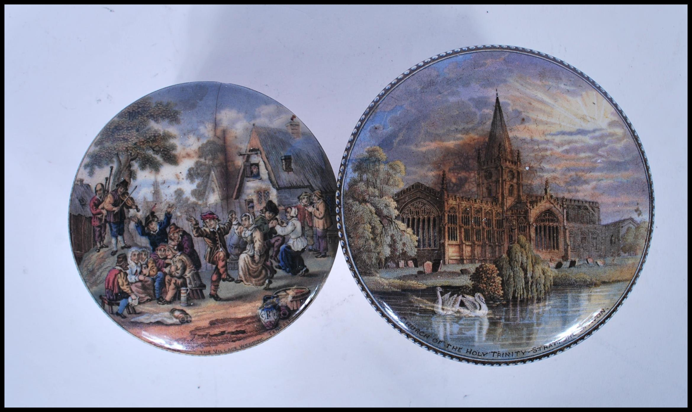 A pair of 19th Century Victorian Pratt Ware decorated pot lids. The lids decorated with The