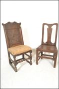 A 17th century Wainscott carved oak chair. Raised on block and turned legs united by a barley