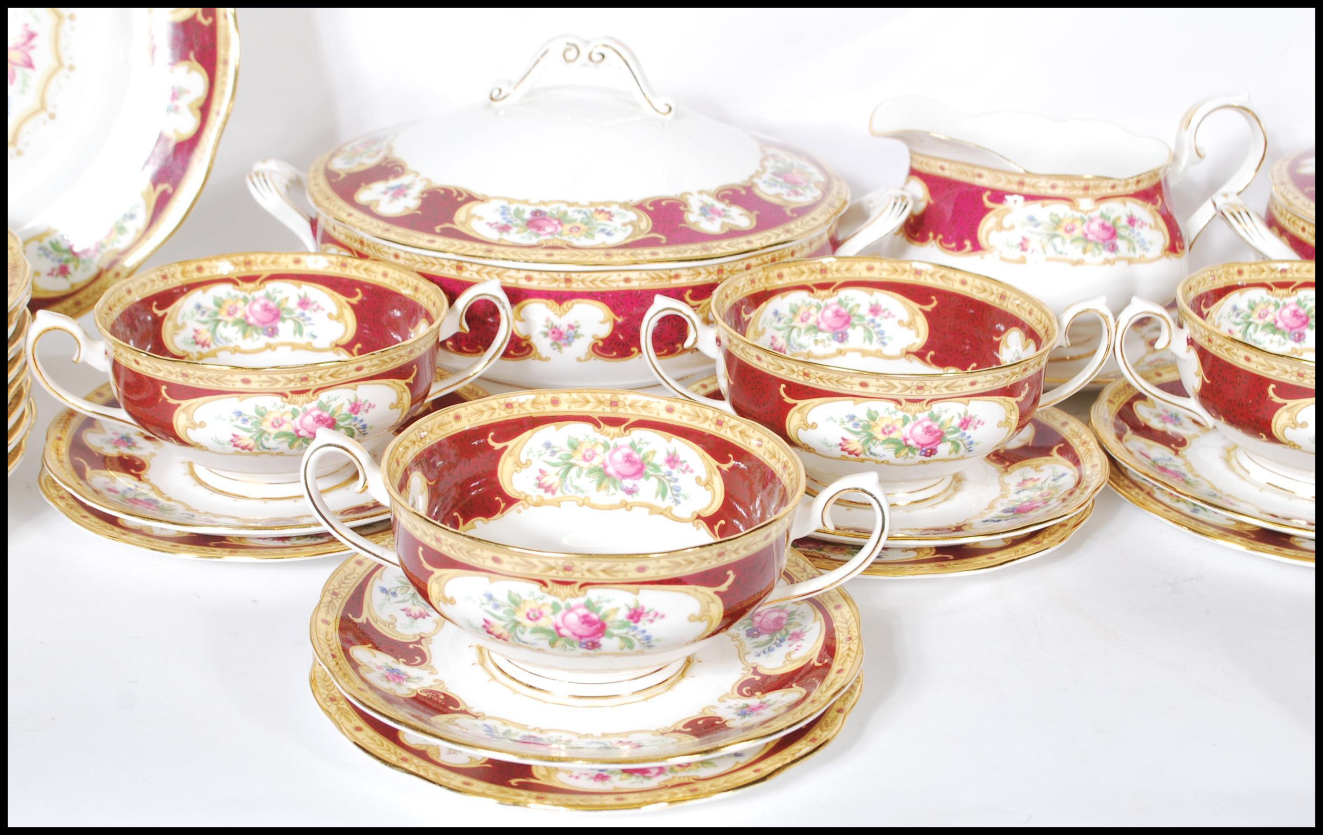 A Royal Albert bone China part dinner service in the Lady Hamilton pattern, comprising soup bowls, - Image 3 of 11