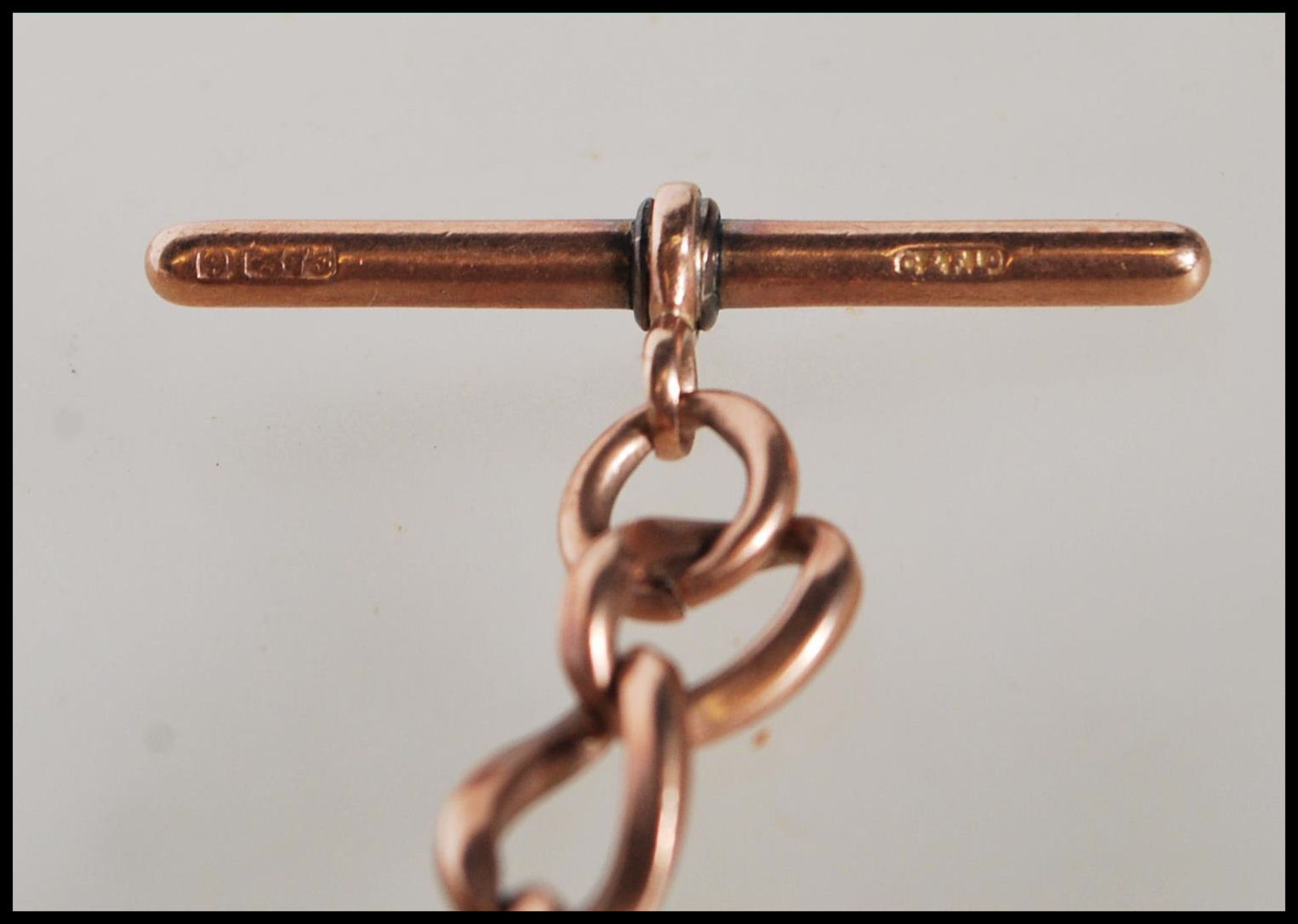 A 9ct gold curb link albert pocket fob watch chain bearing hallmark to every link and T bar, with - Image 6 of 6