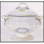 A 19th century Minton Spot & Wreath patterned twin handled lidded pedestal soup tureen, decorated in