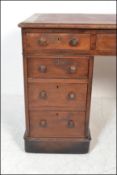 A 19th Century high Victorian twin pedestal mahogany desk, the twin pedestal having a
