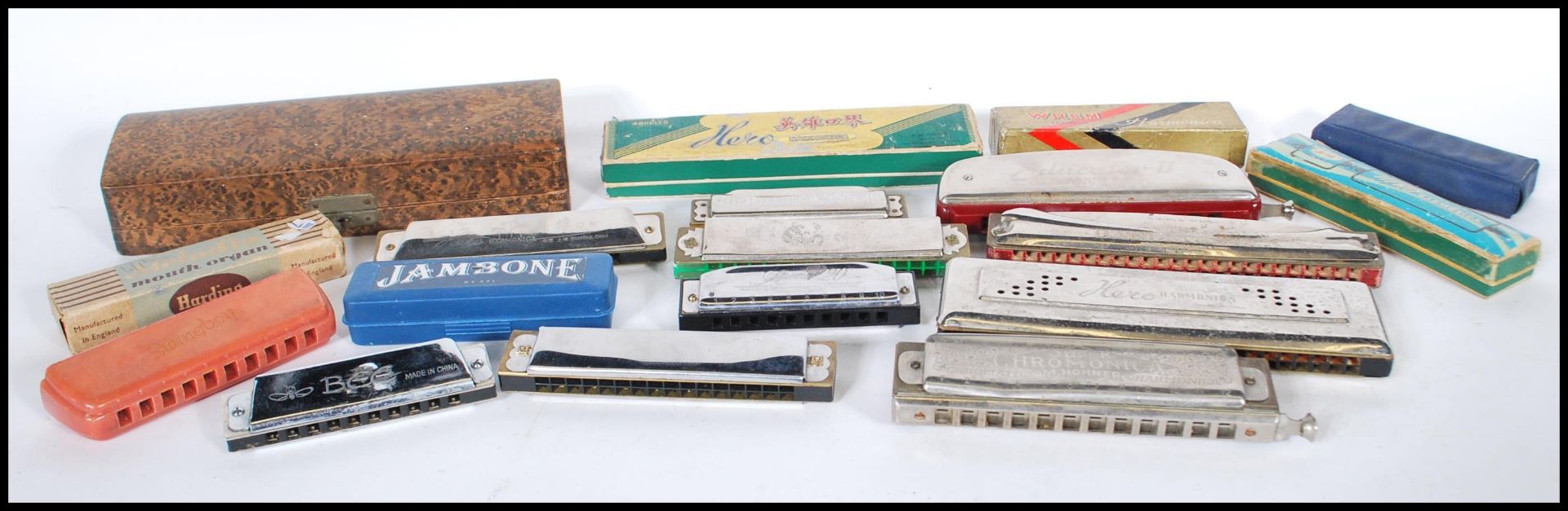 A collection of vintage 20th Century harmonica's t