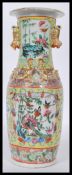 A 19th century Chinese famille rose vase with handpainted scenes of people, birds and butterfly's.