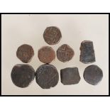 A group of believed Ottoman Empire Akce bronze coins / tokens, most of round form with enmbossed