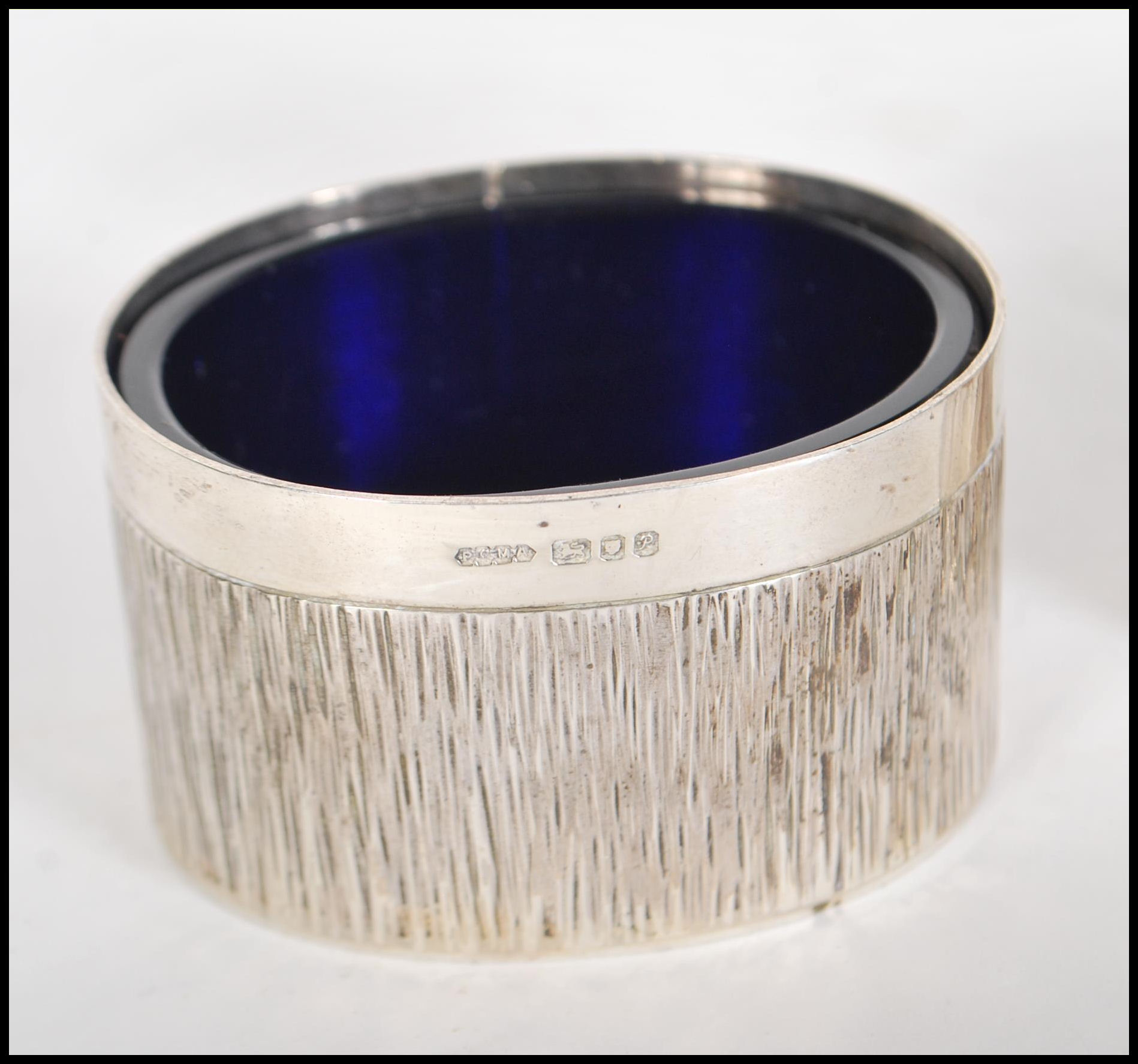 Two silver hallmarked table salts having bark effect decoration and blue glass liners, together with - Image 3 of 5