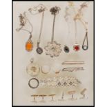 A collection of silver jewellery,  to include a selection of pendant necklaces including a