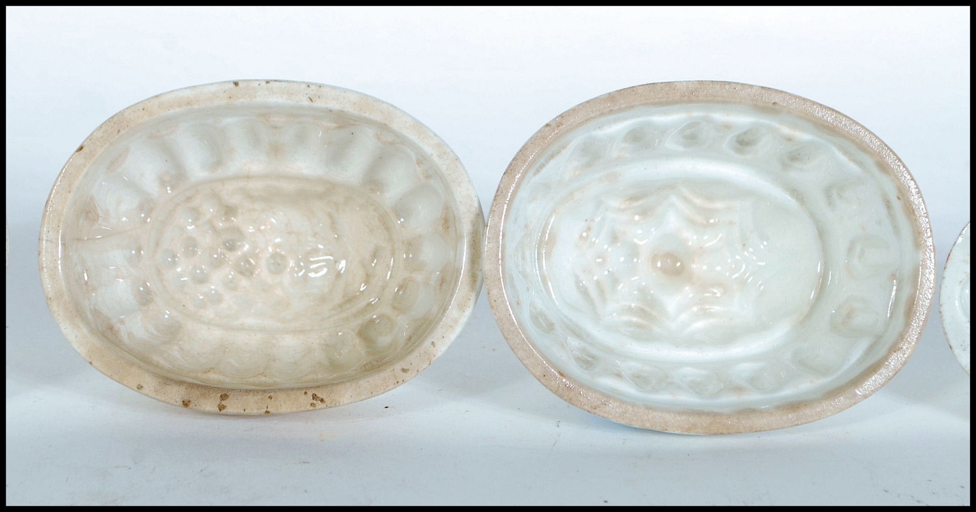 A group of five 19th Century ceramic miniature jelly moulds three having fruit designs to the tops - Bild 3 aus 11