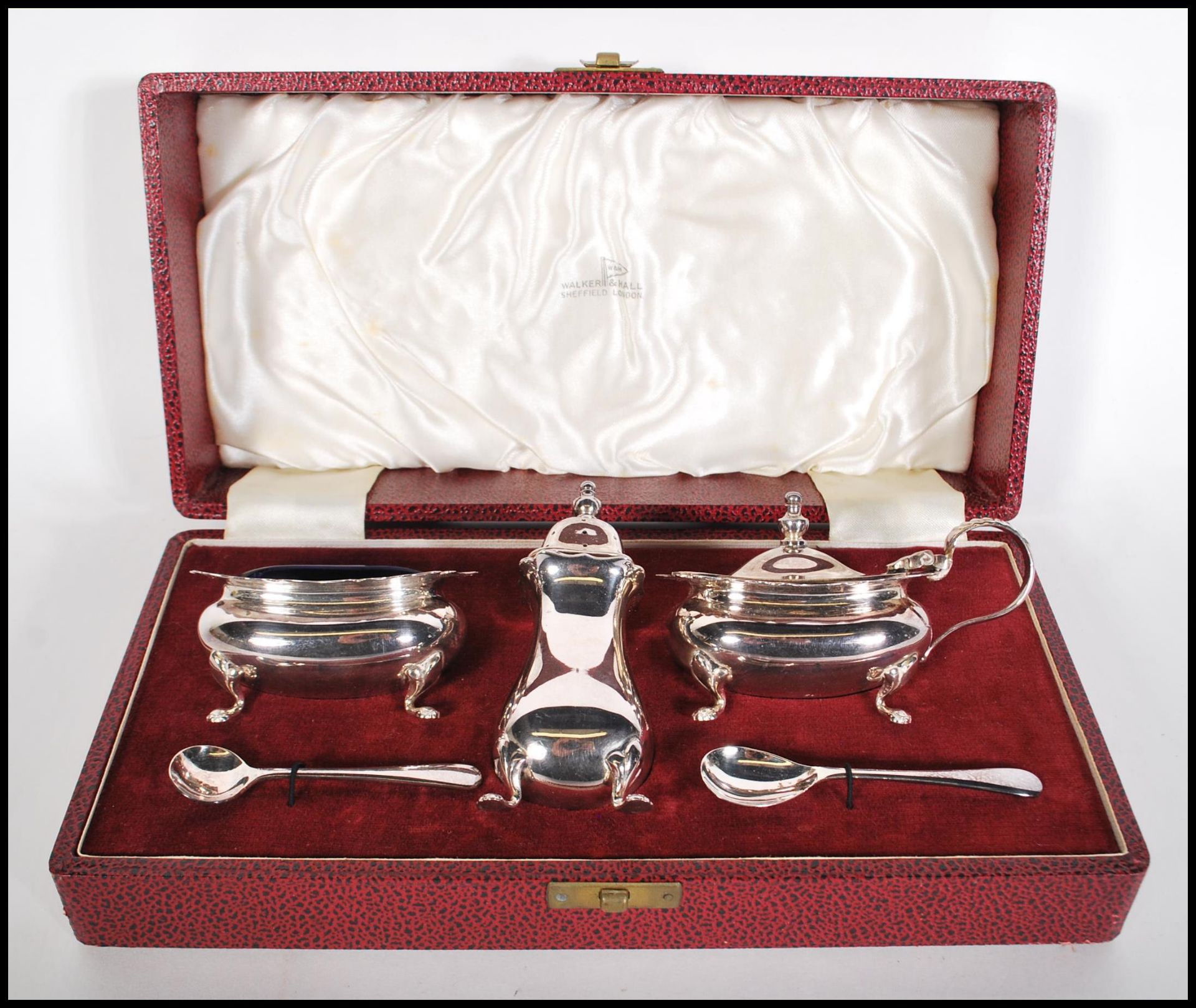 A vintage 20th Century Walker and Hall silver plated condiment cruet set complete in original box