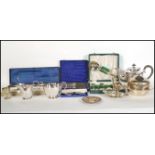 A collection of silver plated items to include a HE&Co bachelors tea set, a set of six EPNS butt