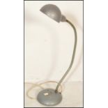 A vintage industrial mid 20th Century factory / office desk work lamp, circular base with