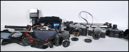 A small group of cameras and accessories to include Praktica MTL 5 in official case with a selection