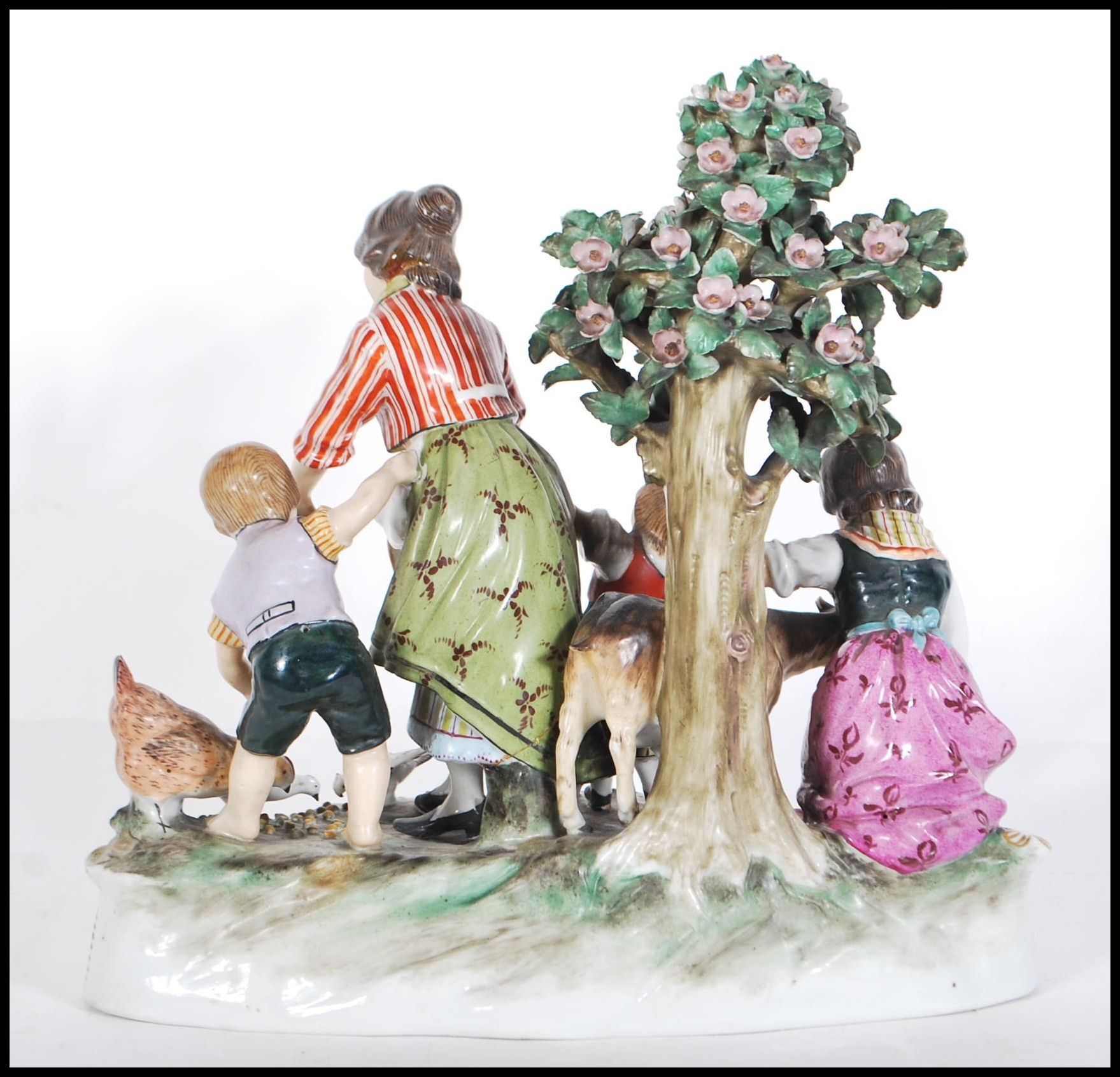 A late 19th Century Continental ceramic figurine group in the manner of Meissen. The group - Image 3 of 9