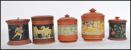 A late 19th Century Pratt ware cylindrical tobacco jar and cover decorated with printed and