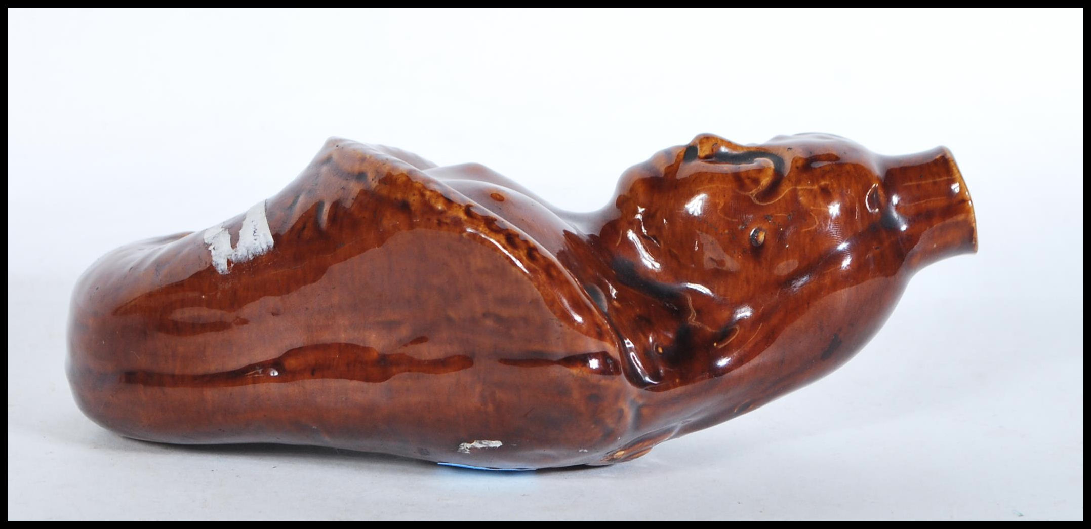 A mid 19th century treacle glaze gin flask in the form of a mermaid. Circa 1840, with waisted top - Image 4 of 6