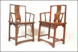 A pair of near matching believe 19th / 20th century Chinese armchairs / elbow chairs having solid