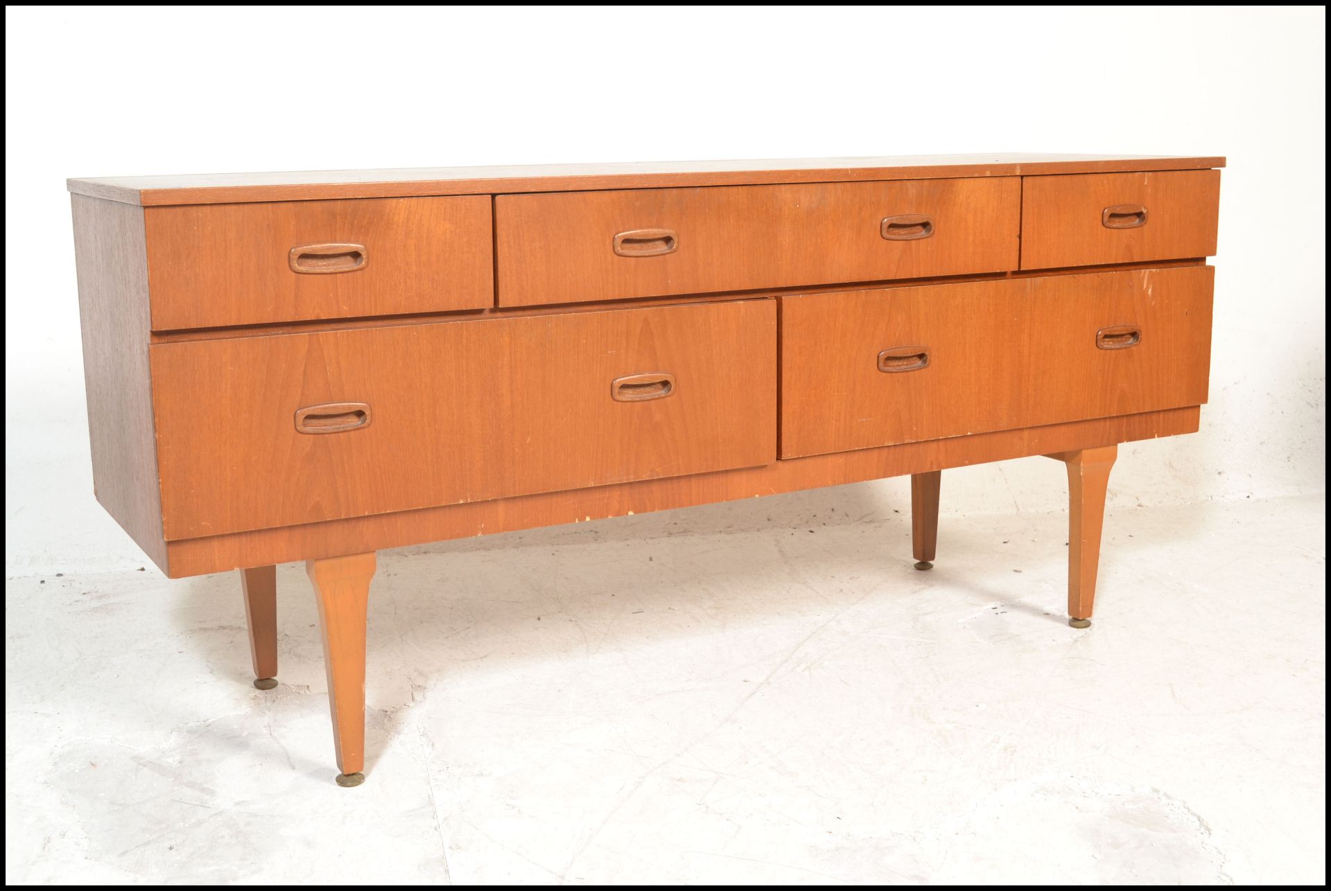 A mid 20th Century retro teak wood sideboard / credenza having a set of short drawers  atop deep - Bild 2 aus 6