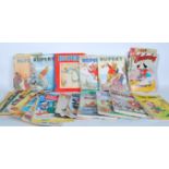 A selection of comics to include Superboy, Superman, Mickey Mouse, Donald Duck, Bullwinkle and