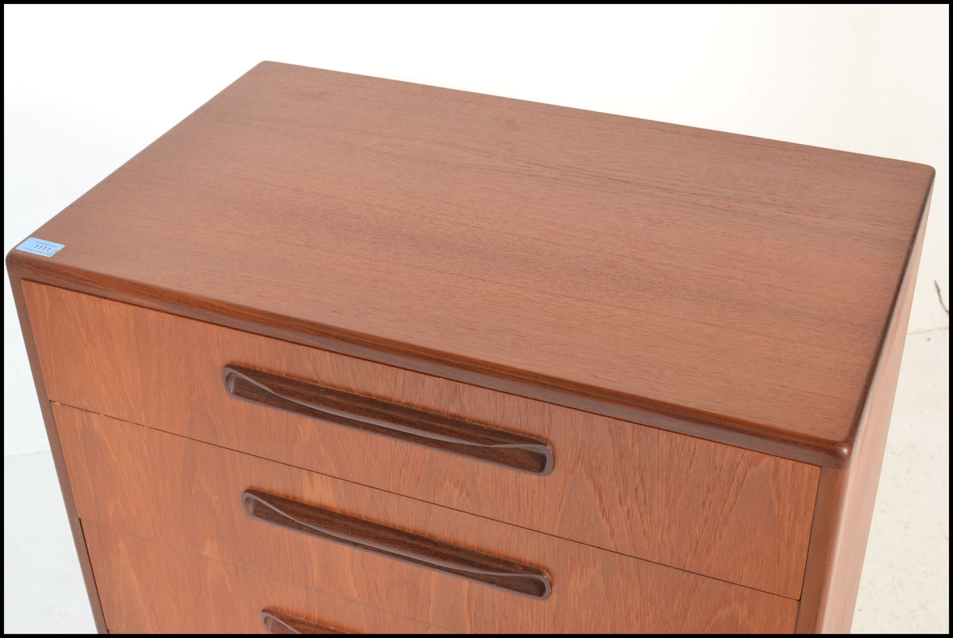 A 1970's G-Plan teak wood Kelso Pattern chest of drawers being raised on an inset plinth with - Bild 2 aus 5