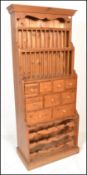 An antique style country pine upright plate rack / spice cabinet. Full size, freestanding cabinet