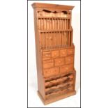 An antique style country pine upright plate rack / spice cabinet. Full size, freestanding cabinet