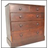 A Victorian 19th century oak chest of drawers. Raised on a plinth base with 2 short drawers having 3