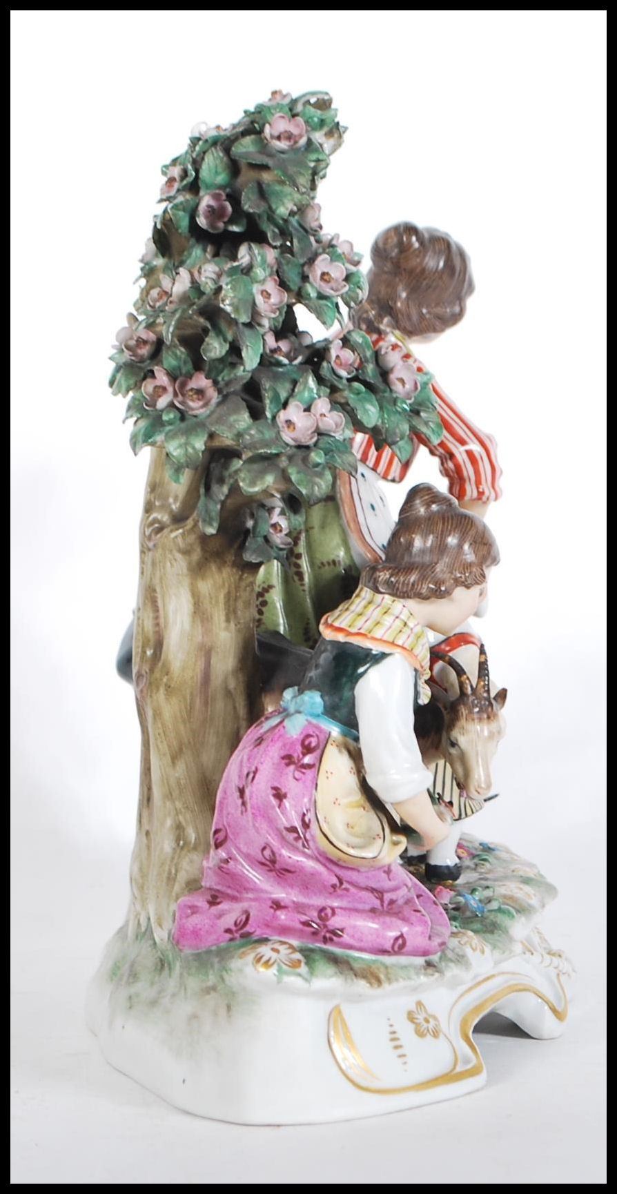 A late 19th Century Continental ceramic figurine group in the manner of Meissen. The group - Image 2 of 9