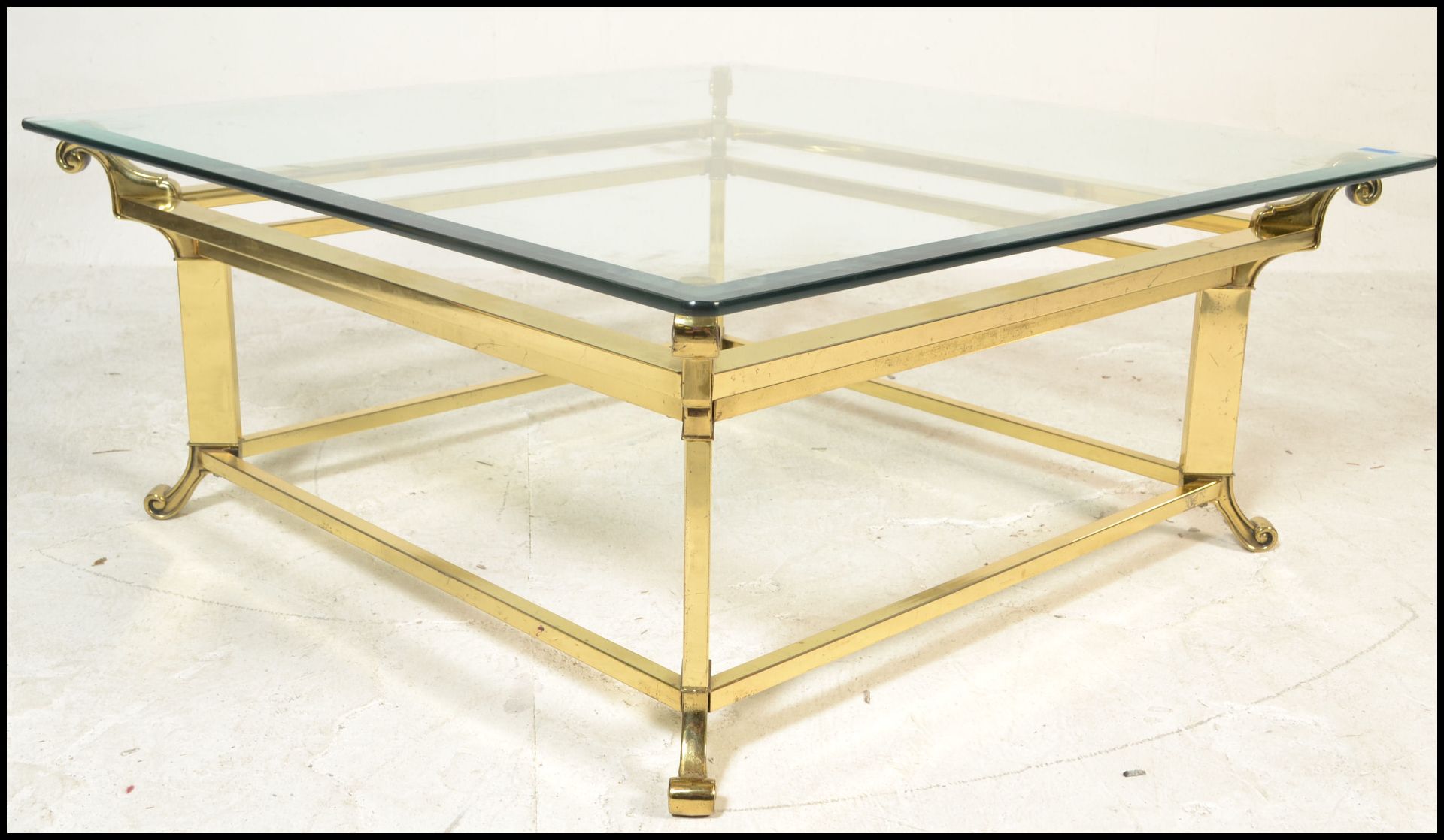 A 20th Century brass and glass top Italian design coffee table of square form raised on scroll - Bild 4 aus 5