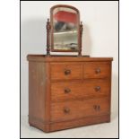 A Victorian mahogany dressing chest of drawers being raised on a plinth base with short and deep