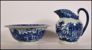 A 19th Century Victorian ironstone wash jug and bowl transfer printed in blue and white with a