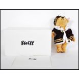 A boxed Steiff teddy bear titled 'Henry VIII' limited production No. 290, having relevant labels and