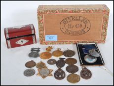 A collection of assorted medals to include two medals awarded to an Edwin Day from the Bristol