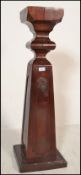 A mahogany antique Victorian style pedestal plant torchere stand of inverse tapering form with
